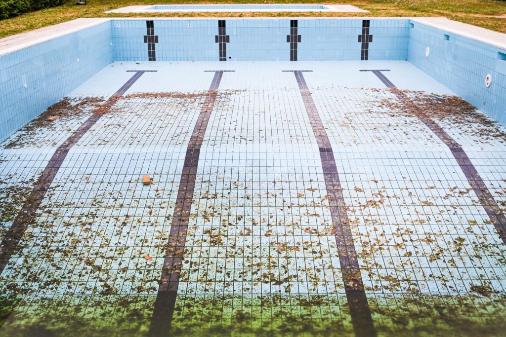 Empty swimming pool prepared for vinyl liner replacement in VA